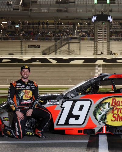 Christopher Bell at the Daytona 500 Qualifying presented by Busch Light, posing with his No. 20 Interstate Batteries Toyota on the starting grid at Daytona International Speedway.